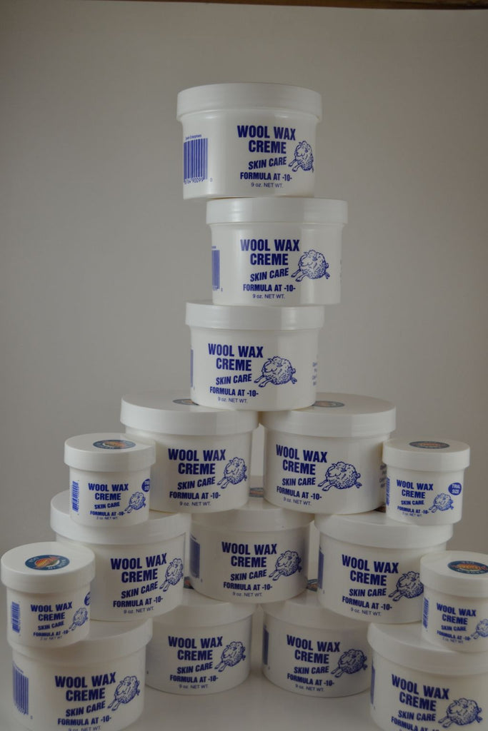 12 nine ounce jars and 4 two ounce jars Wool Wax Creme